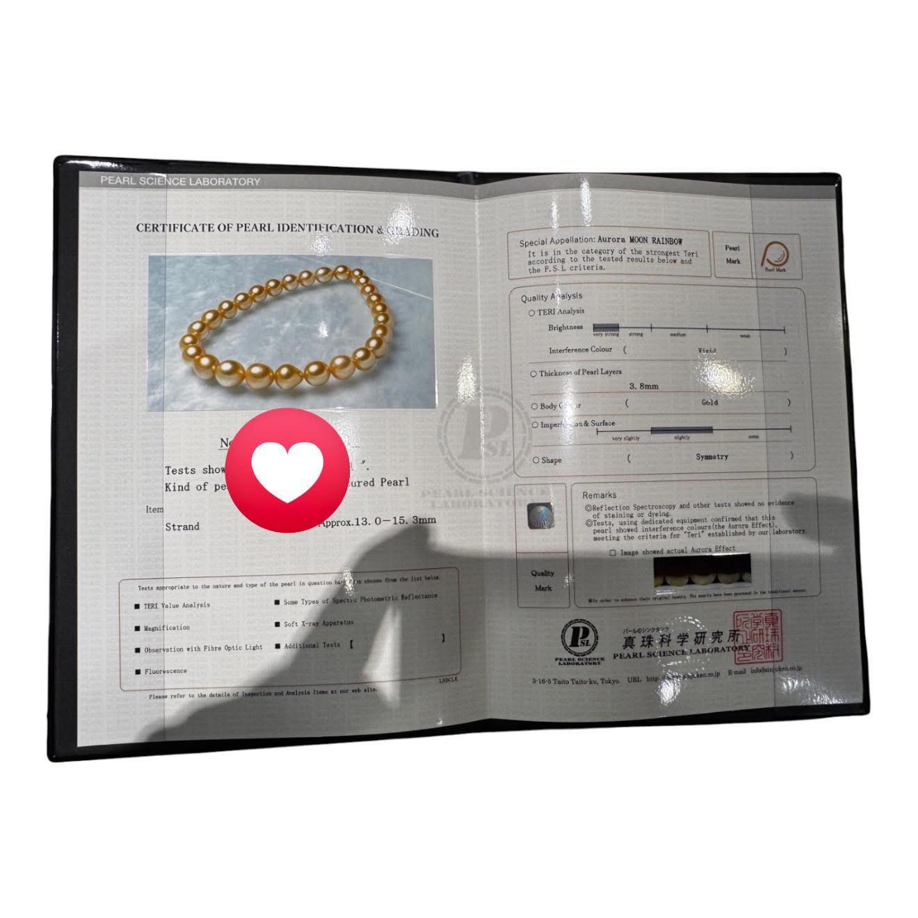 Sổ kiểm định ngọc mới toanh toành toanh của The Pearl.
